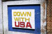 Political propaganda at walls of old US emabassy. Tehran. Iran.
