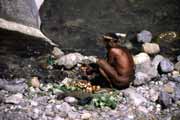 Sweet potatos washing. Papua, Indonesia.