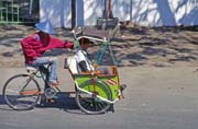 Becak - typical indonesian way of local transport. Ujung Pandang. Sulawesi, Indonesia.