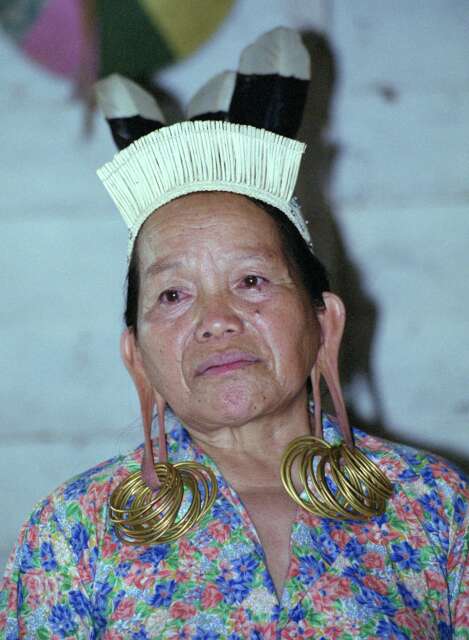 Dayak women in traditonal costume in Long Uro village. Kalimantan,  Indonesia.