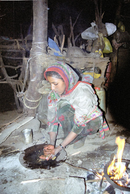 Coffee preparation during coffee ceremony. Local village at Simien mountains. North,  Ethiopia.